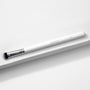 ColourPop Medium Dome Brush blending detail eye makeup - white-handled makeup brush with chrome ferrule and domed black‑to‑white bristles, marked E7 - resting diagonally on a minimalist white textured backdrop.