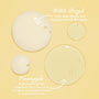ColourPop Face Cleanser Pore Real Cleanser showcasing ingredient drops - creamy and translucent puddles on a pale yellow background - highlighting witch hazel to reduce oil and improve clarity and pineapple extract rich in vitamin C and bioflavonoids.
