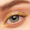 Black on Black BFF Mascara coats and separates lashes on a grey eye, paired with metallic gold eyeliner and a natural brow, highlighting the deep black finish of ColourPop BFF Mascara.