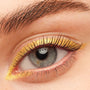 Black on Black BFF Mascara coats and separates lashes on a grey eye, paired with metallic gold eyeliner and a natural brow, highlighting the deep black finish of ColourPop BFF Mascara.