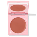Bali Baby ColourPop Cream Blush opens to reveal a matte rosy-nude pan in a light pink compact with white star accents and a built-in mirror, studio-lit on a white background.