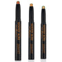 Love Triangle trio of ColourPop Shadow Stix stand uncapped to display shimmery multichrome tips - copper-red, golden bronze, and green-teal - in sleek black twist-up pens with The Twilight Saga New Moon branding, set against a clean white background.