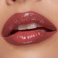 Glossy, plumped pink‑mauve lips softly parted, lined and filled with Glazed Pout from the ColourPop So Juicy Plumping Lip Liner & Balm Set, shown in a studio close‑up to highlight high‑shine finish, smooth texture, and precise definition.