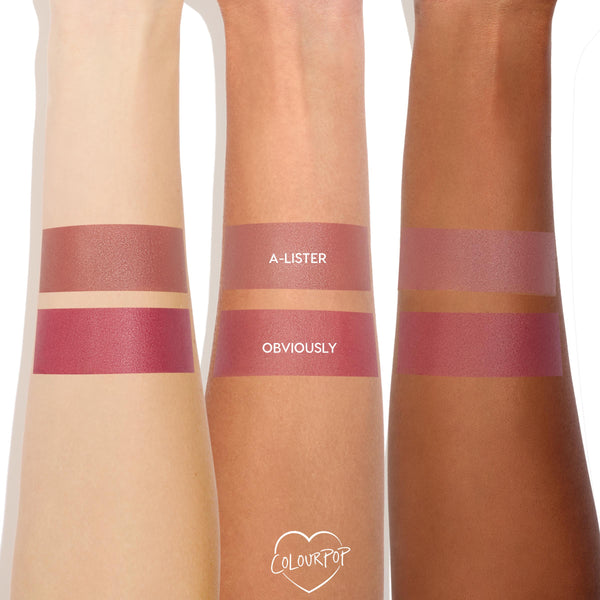 ColourPop Cream Blush in A-Lister swatched as the top stripe on three arms from fair to deep, showing a soft mauve‑pink sheen; the lower stripe shows the deeper rosy shade Obviously for comparison.