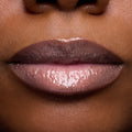 Close-up swatches of Colourpop Peach Mochi Fresh Kiss Glossy Balm on models’ lips, showing sheer peachy shimmer and high-shine finish, highlighting how this Lip Gloss & Lip Oil hybrid looks on different skin tones.