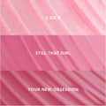 Gloss Me Up ultra glossy lip set swatches showing three Heart to Get shades—shimmery pale pink labeled “2 Die 4,” creamy mid-pink labeled “Still That Girl,” and rich rose pink labeled “Your New Obsession,” arranged in a vertical grid for US shoppers.
