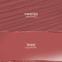 Anti-Hero kit swatch shows Twisted Lippie Pencil above Toxic ColourPop Lux Lipstick, both in rosy mauve; pencil features textured strokes while the lipstick is a smooth satin block - flat lay close-up previewing shade and finish.