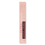 ColourPop LAX Ultra Matte Lip liquid lipstick showcased in a blush-pink box with star accents, the deep burgundy tube visible through a cutout, standing upright against a clean white background.
