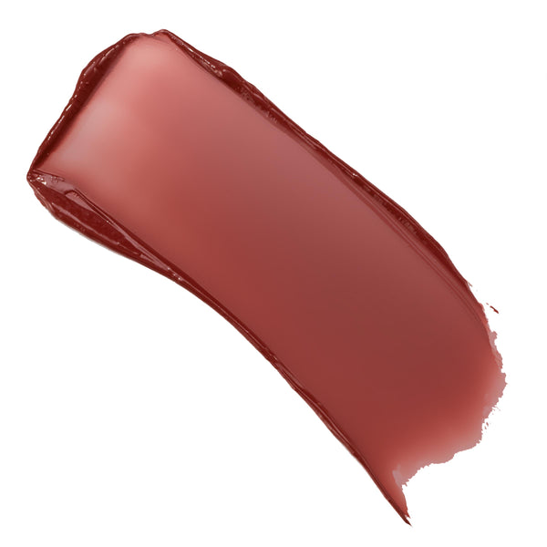 Fairytale Things ColourPop Lip and Cheek Balm swatch, a single smooth curved swipe showing a creamy satin finish in a warm rosy‑mauve shade, spread thickly with feathered edges on a clean white background.