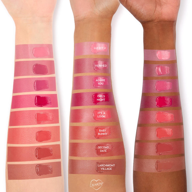 It’s a Look ColourPop Lip and Cheek Balm swatched on three arms (light, medium, deep skin tones), revealing a warm rosy pink with a dewy finish, shown alongside labeled shades like Girls Night and Baby Bunny for easy shade comparison.