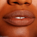 Lips lined and filled with ColourPop Lippie Pencil in BFF 3, showcasing a warm brown matte finish; close-up swatch for The Lil Box of Lippie Pencils under studio lighting, highlighting smooth texture and precise outline.