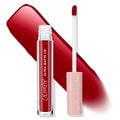 Melonade shade of ColourPop Ultra Matte Lip stands open with a doe‑foot applicator and clear tube, showing a bold deep red pigment; a sweeping red swatch behind and a blush‑pink cap with white stars on a clean white background.