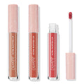 ColourPop Ultra Blotted Lip OG Babes bundle stands upright, one tube opened to reveal a rosy pink doe-foot applicator; three nude-to-rose shades in clear tubes with blush star caps, set on a clean white background.