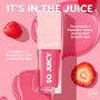 Clear square tube of ColourPop So Juicy Plumping Glossy Lip Oil in Lychee Jelly showcases a bright pink formula, highlighting ceramides, peptides, and raspberry + strawberry oils against a glossy pink backdrop with berries.