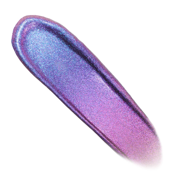Same Vibe ColourPop Chrome Liquid Shadow swatch shifts from electric blue to violet-pink, glimmering with fine shimmer in a smooth, elongated swipe on a white background, showcasing its bold duochrome payoff.