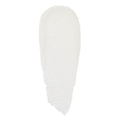 Translucent white, sugar-granule swatch of Just One Bite ColourPop Lip Scrub, smeared in a single elongated swipe with fine crystals catching light on a clean white background.