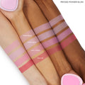 ColourPop Pressed Powder Blush, Cupid’s Bow, swatched in horizontal bands on three skin tones, a cool pink shade shown beside Sweetheart, Hot 2 Touch, and Woo Me, with a pink heart-shaped compact at the edges.